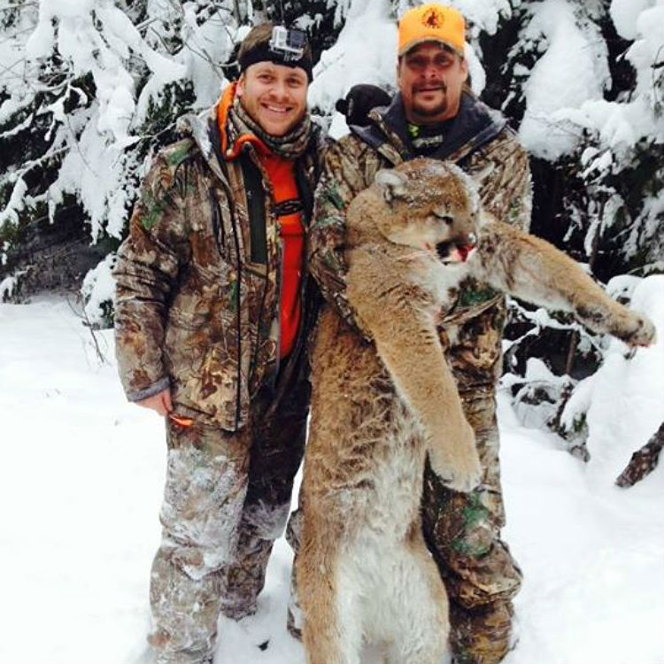 Kid Rock sparks anger by killing a mountain lion + posing with it