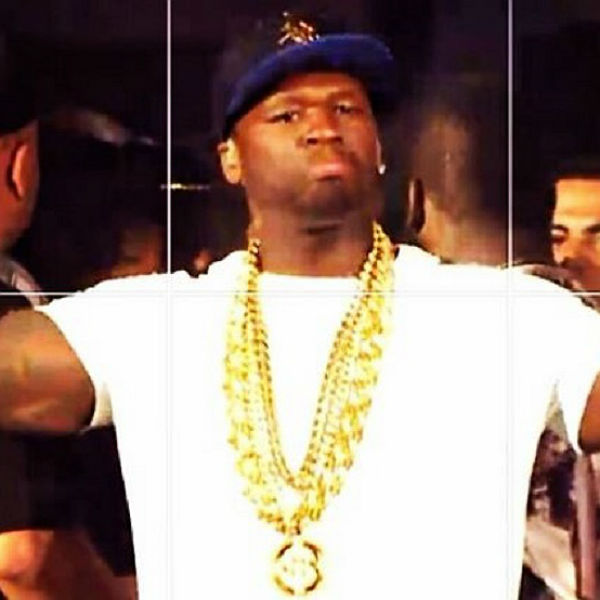 50 Cent robs a rival rapper's chain during Hot 97 stage brawl