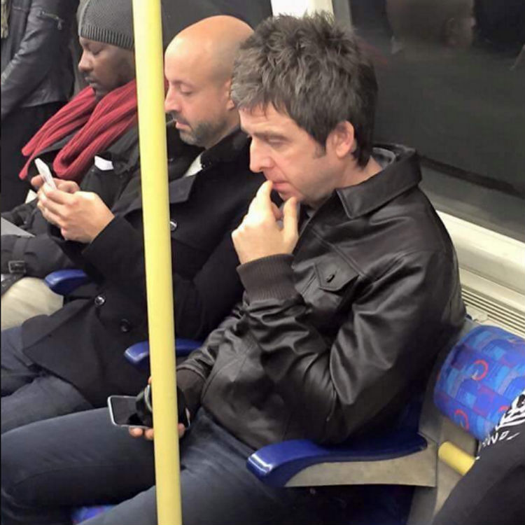 Noel Gallagher on London Underground Tube to U2 show - photos