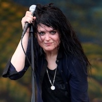 The Dead Weather Rock Out In The Rain At New Orleans Jazz Festival