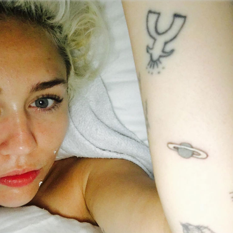 Miley Cyrus new tattoo mocked Instagram, confusing Instagram & Jupiter