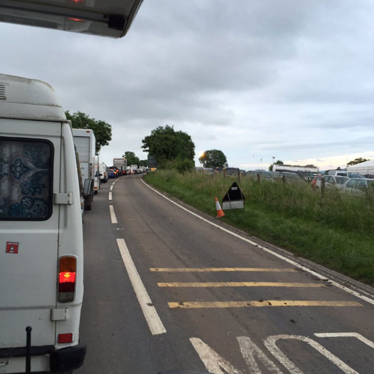 Glastonbury Festival traffic on roads, told not to set off yet