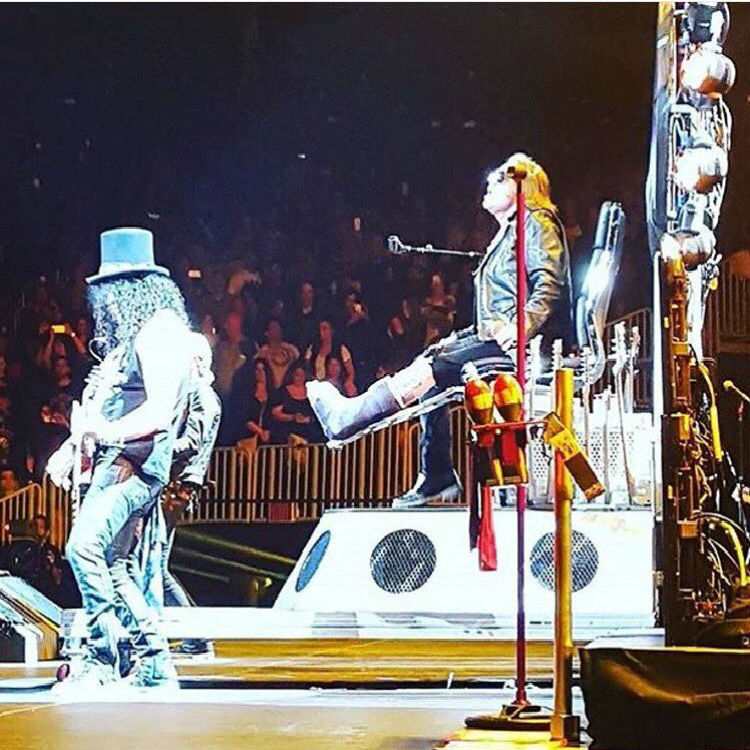 Axl Rose breaks foot performs on Dave Grohls throne guns roses 