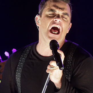 Robbie Williams hits back at Radio One with joke threat