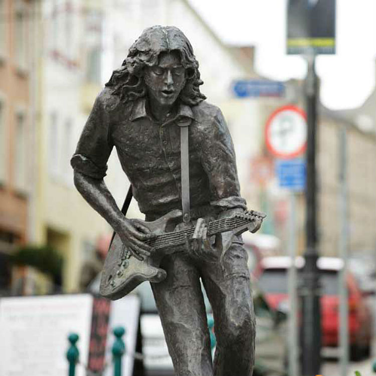 Rory Gallagher Strat Guitar songs statue Belfast best album Deuce
