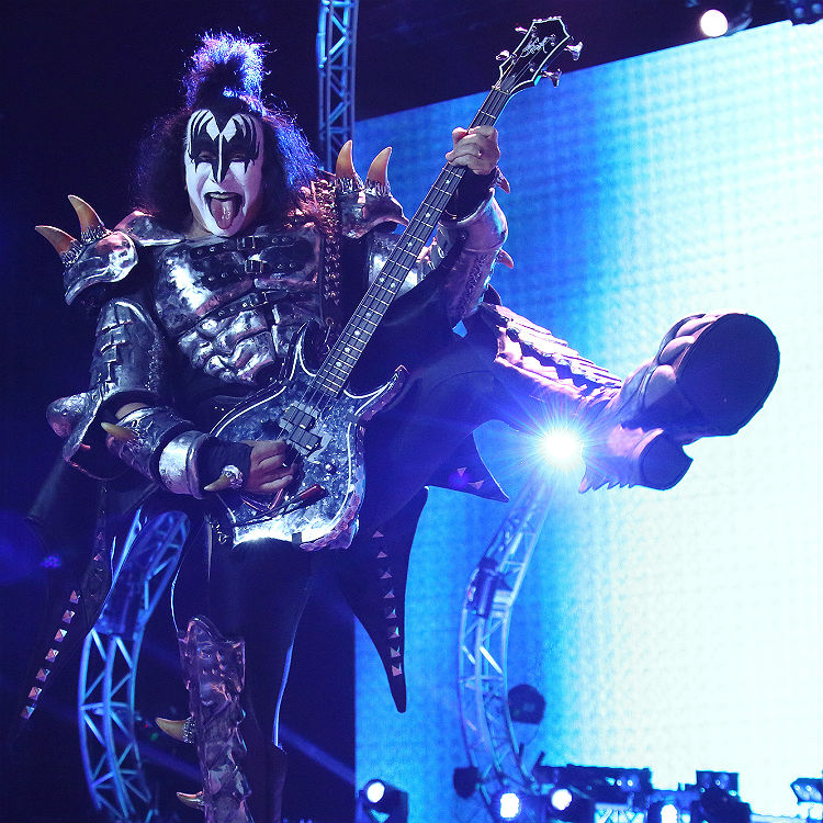Kiss' frontman Gene Simmons falls over on stage - viral video