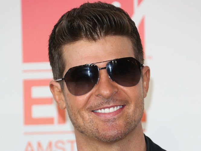 Robin Thicke: For 'Blurred Lines' obviously. And the fact it's the ONLY song he ever performs live. And the fact he's always wearing a pair of bloody aviators. 