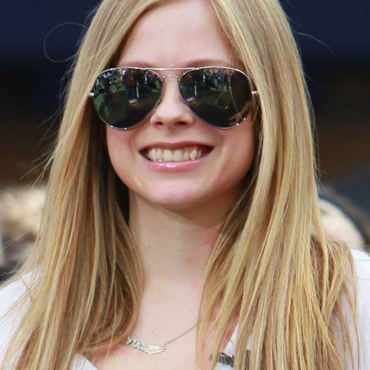 Avril Lavigne: The reason why so many teenage girls wear stripey arm bands