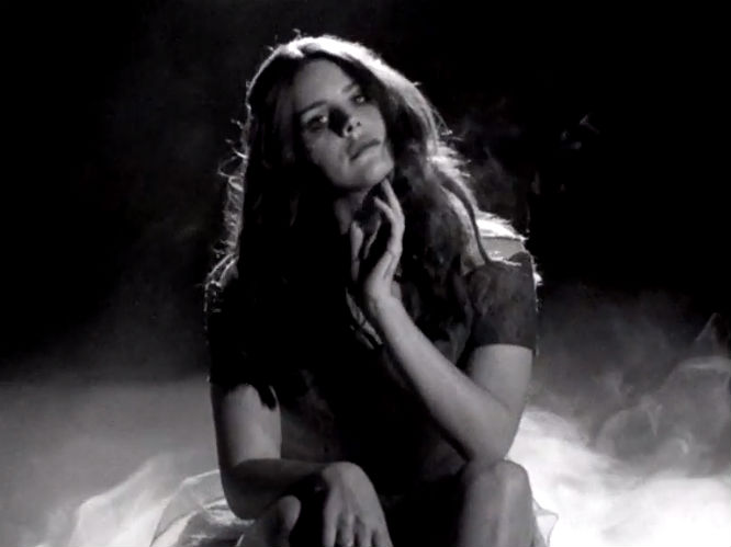 May 27 - The promo clip for Ultraviolence leaks: The 17 second clip features the official audio of the album's title track, as well as - guess what? - moody, black and white shots of Lana looking wistful. 