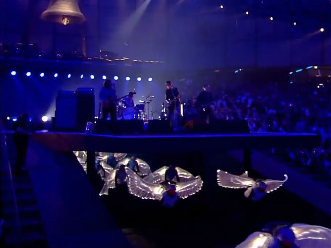 Olympics Opening Ceremony, London - 2012: The band dazzle the entire world with a dazzling performance of 'I Bet You Look Good On The Dancefloor' and a cover of The Beatles' 'Come Together' - with a little help from some angels on bikes. 