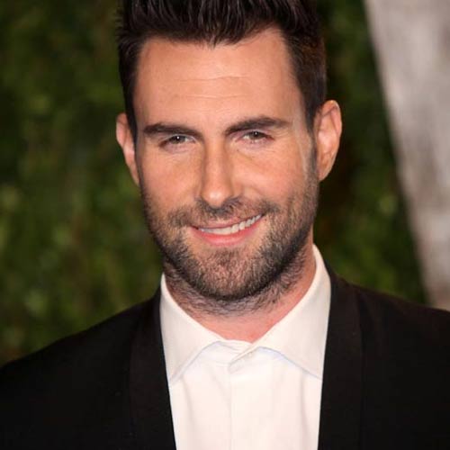 Charming Maroon 5 star Adam Levine claims he is no 'mysogynist pig', blaming his promiscuity on his love for women, 