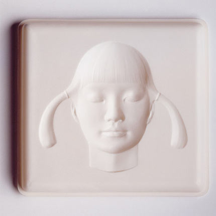 Spiritualized: 'Let It Come Down' (2001) - What looks like a 3D image of a girls face, is actually far from it. The album box is actually a concave carving, but the girls face jumps out at you and moves. Better seen in the flesh, it's a phenomenal design. 