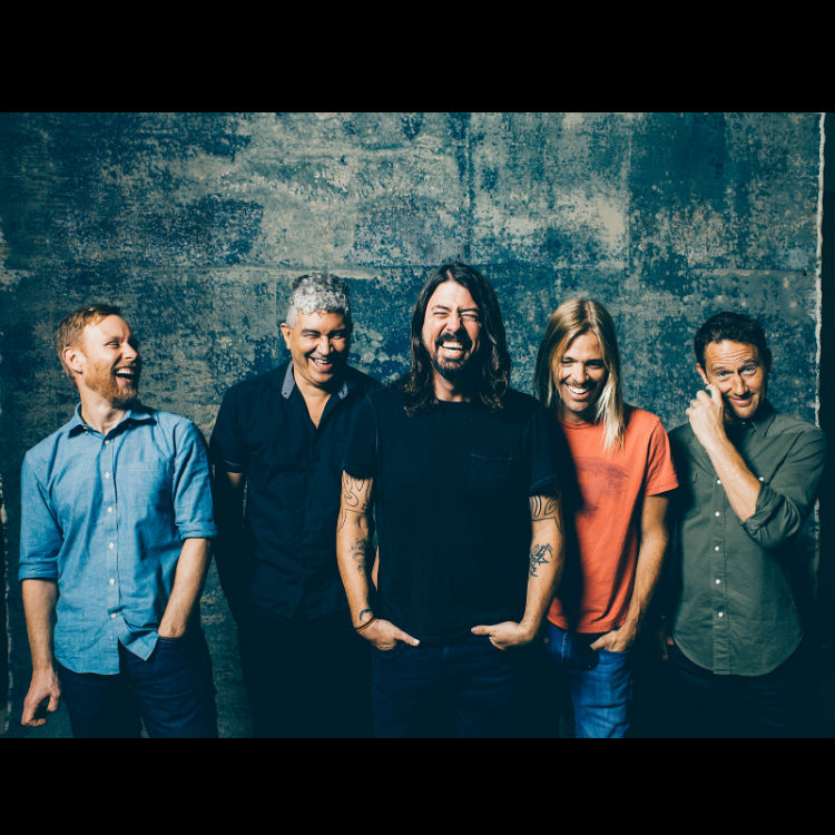 Dave Grohl debuts new song The Sky Is A Neighbourhood at charity gig